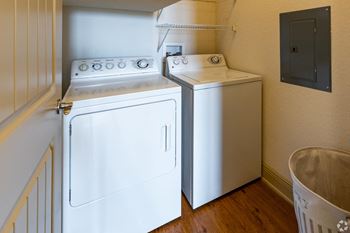 Classic unit with laundry room with full size washer and dryer